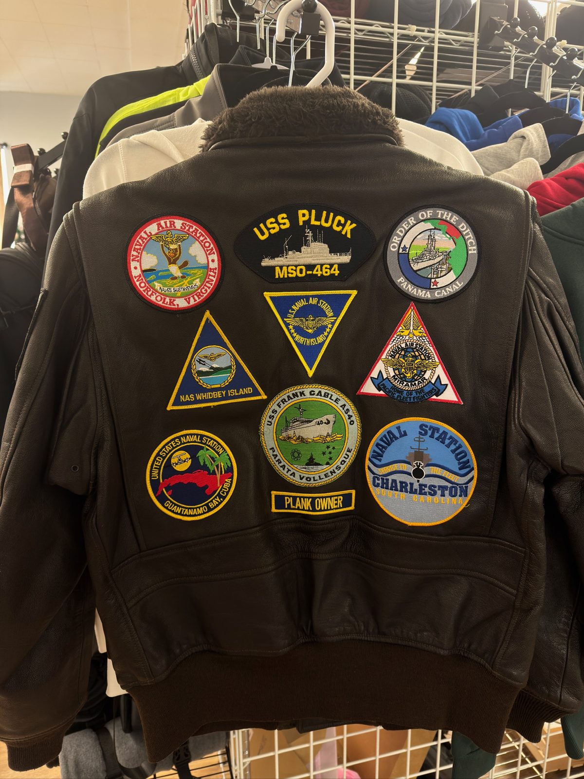 Leather flight jacket with applied Navy patches